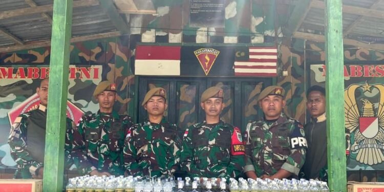 Satgas Pamtas Yonarmed 4/Parahyangan Gagalkan Penyelundupan Ratusan Botol Miras dari Malaysia
